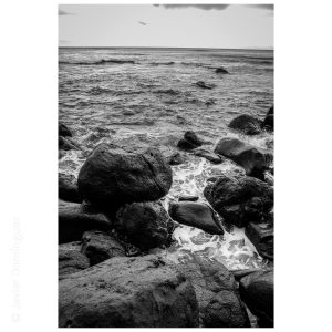Volcanic stones on a Kauaian beach.