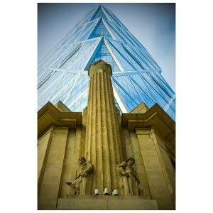 A combination of the old with the new. The Hearst Tower, HQ of magazines like Cosmopolitan, Elle, and Country Living, has a traditional stone foundation and a more modern reflecting tower above it.