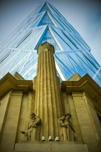 A combination of the old with the new. The Hearst Tower, HQ of magazines like Cosmopolitan, Elle, and Country Living, has a traditional stone foundation and a more modern reflecting tower above it.